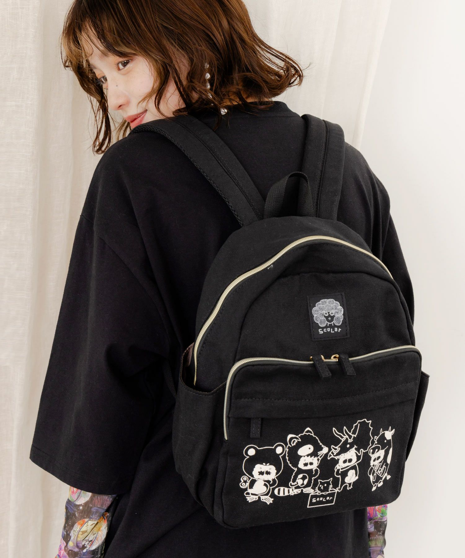 652430：いろんなラビル柄 コットンキャンバスミニリュックの通販-ScoLar 